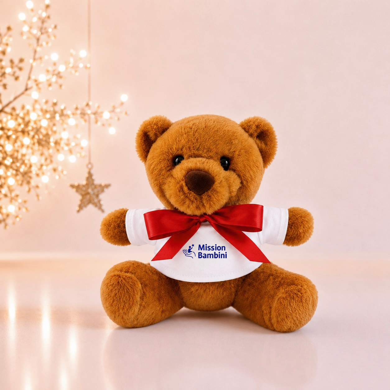 Orsetto di peluche solidale Mission Bambini come idea regalo di Natale per sostenere i bambini cardiopatici.
